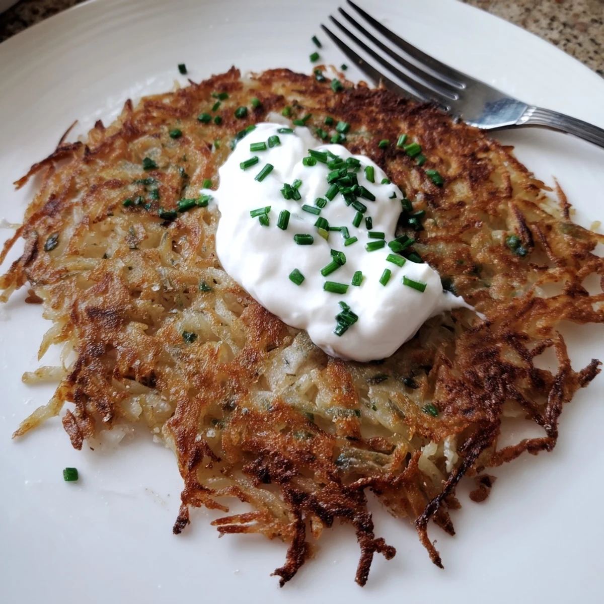 Knusprige Kartoffelpuffer Sauerrahm