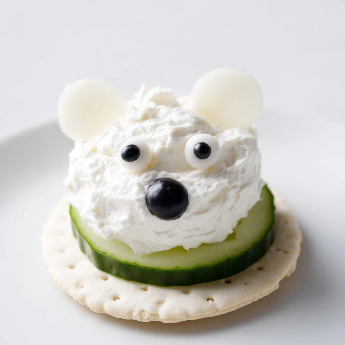Adorable Polar Bear Iceberg Cracker Stacks, a whimsical appetizer with radish ears and crisp cucumber.