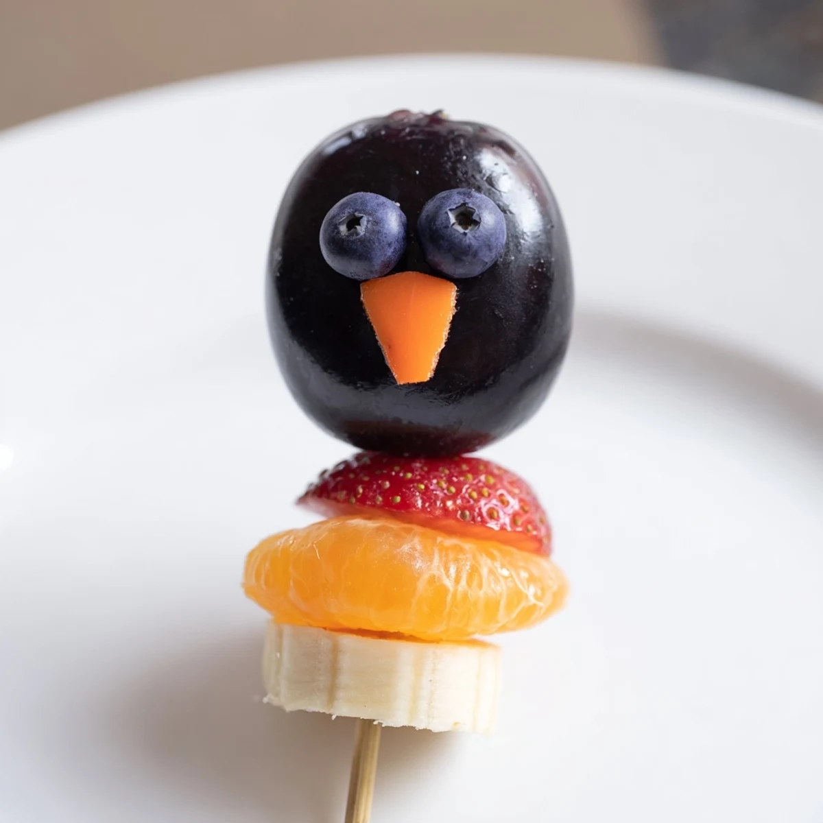 Vivid Penguin Fruit Skewer Army with colorful fruit; a fun, healthy snack ready to serve.