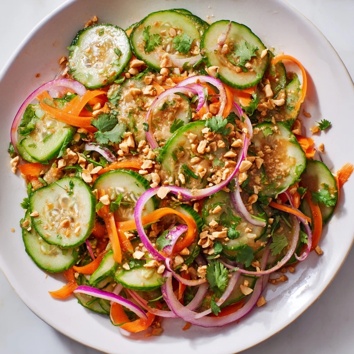 Crisp Thai-Style Peanut Cucumber Salad, vibrant with fresh cilantro and crunchy peanuts.