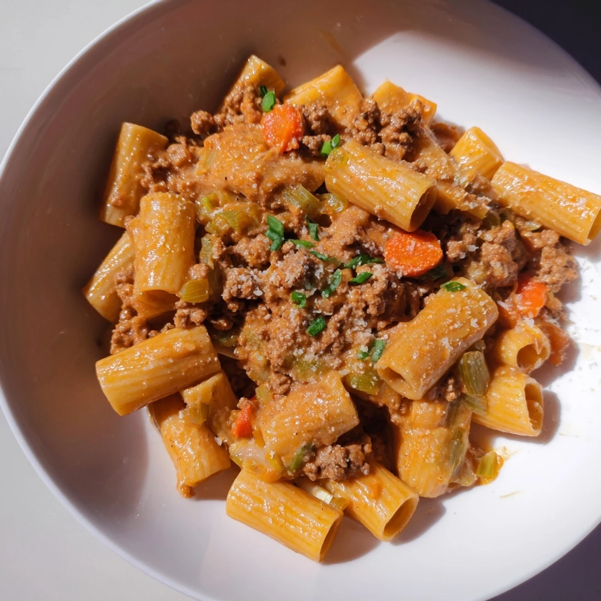 A bowl of flavorful Chaos Cooking Kimchi Ragu Pasta, ready to be enjoyed.