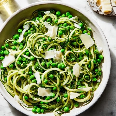 Vibrant The English Ivy salad: Crispy snap peas and tangy cheddar, ready to serve and enjoy.