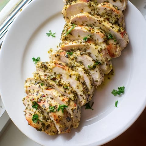 A close-up of tender Greek yogurt chicken, beautifully browned and perfect for a healthy meal.