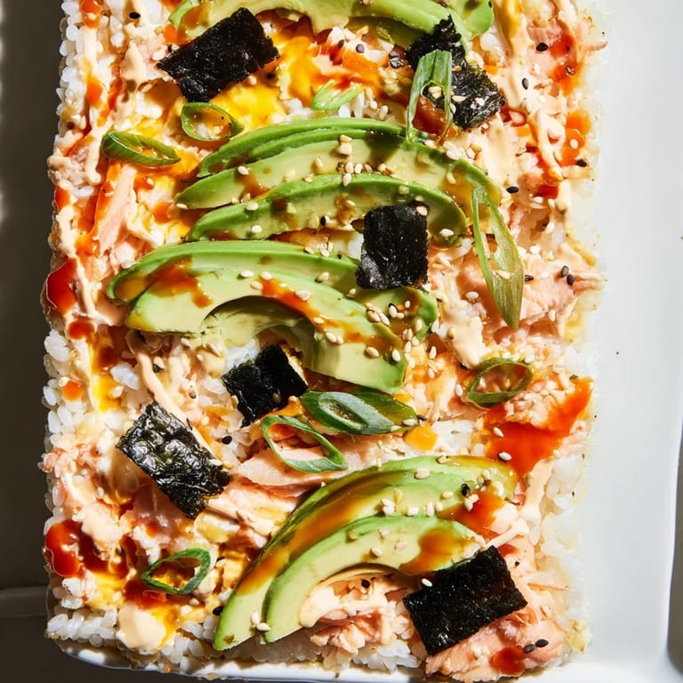 This colorful Sushi Bake Casserole, with flaked salmon and nori, is a perfect, easy weeknight meal.